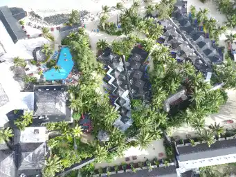 Aerial view of a resort and its facilities on tropical island